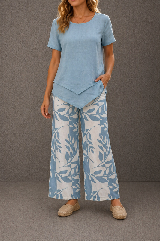 Olivia - Conjunto compuesto por un top de cuello redondo y unos pantalones anchos.